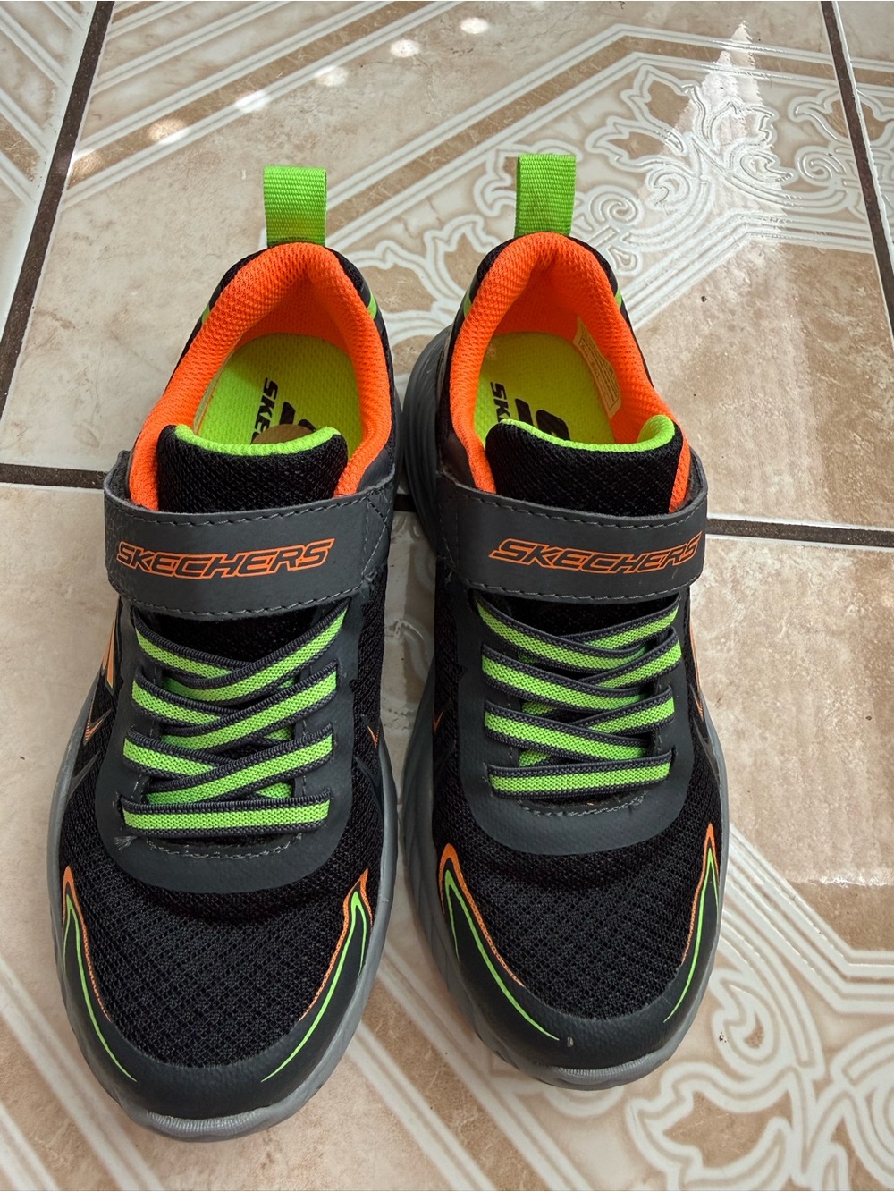 Skechers Kids Black Sneakers with Orange and Neon Green Accents